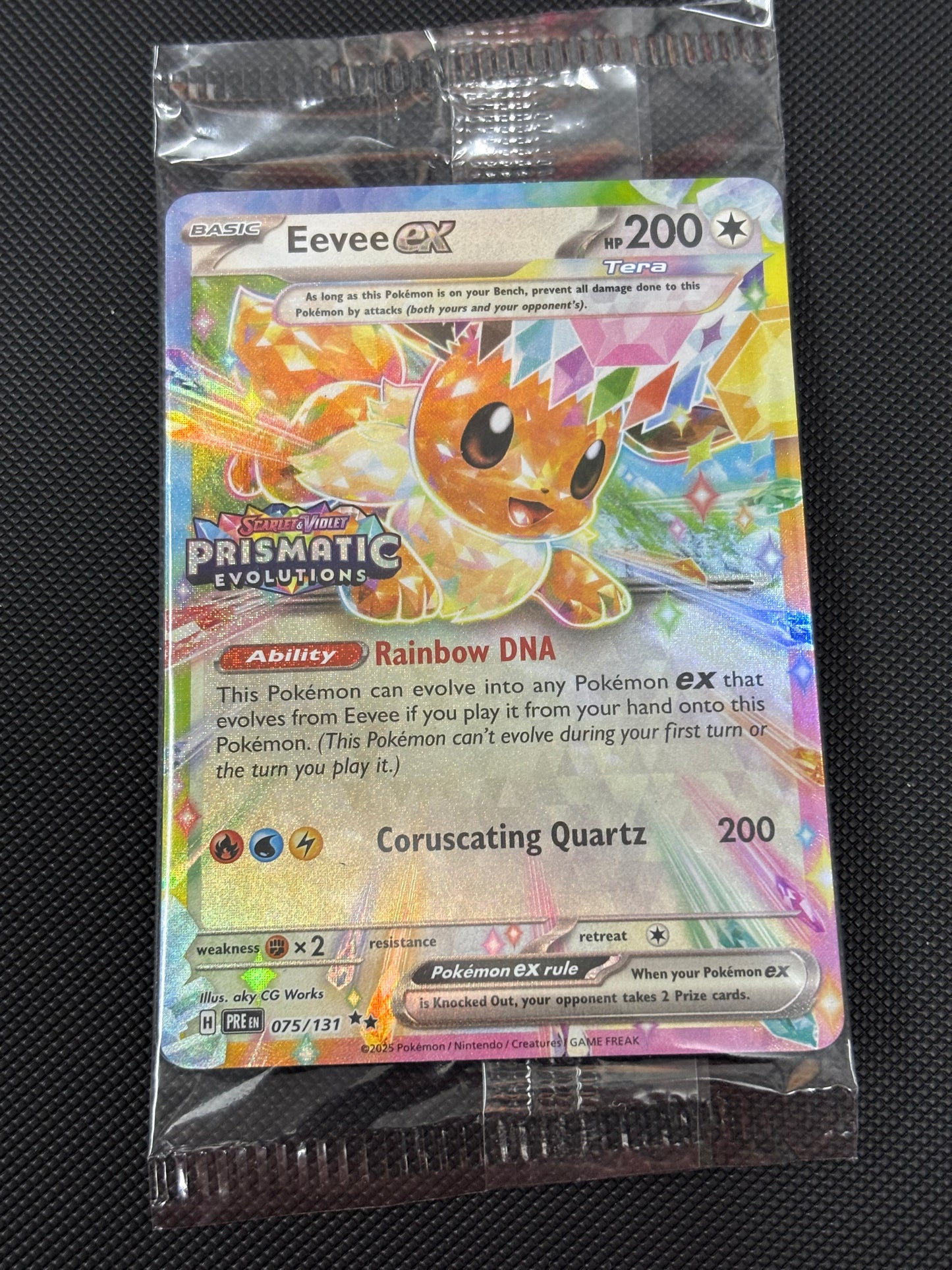 Prismatic Evolutions Surprise Box Stamped Eevee EX 075/131